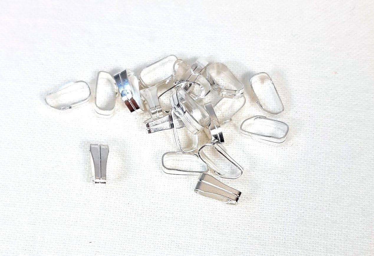 Lot de 800 petites b&eacute;li&egrave;res m&eacute;tal couleur argent